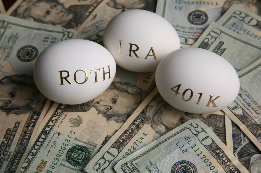 Roth IRA 401k nest eggs on a stack money