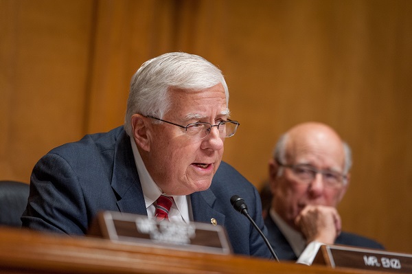 Senator Enzi questions witnesses at a Senate Finance Committee subcommittee hearing